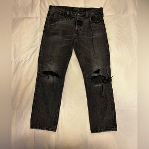 Levi’s ripped black jeans 501